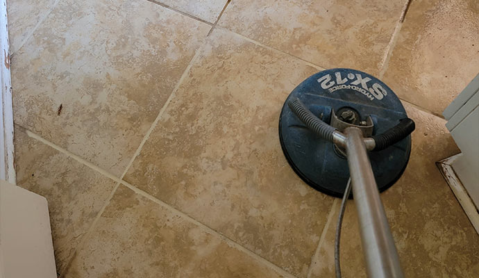 Tile cleaning using equipment